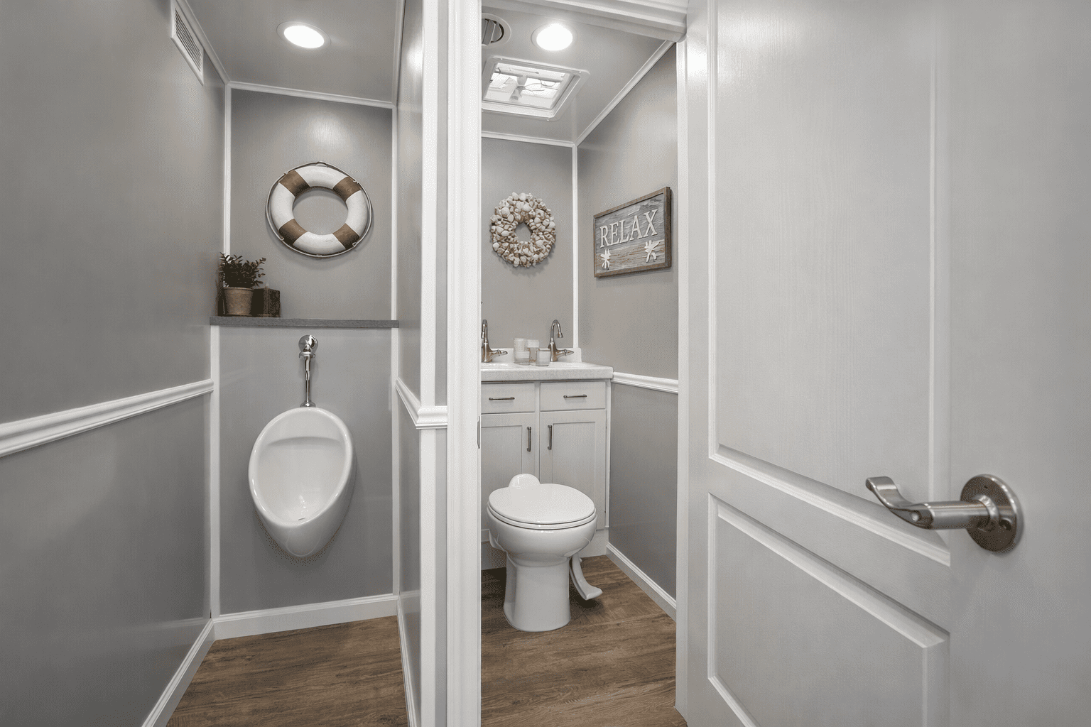 Urinal and toilet in restroom trailer rental