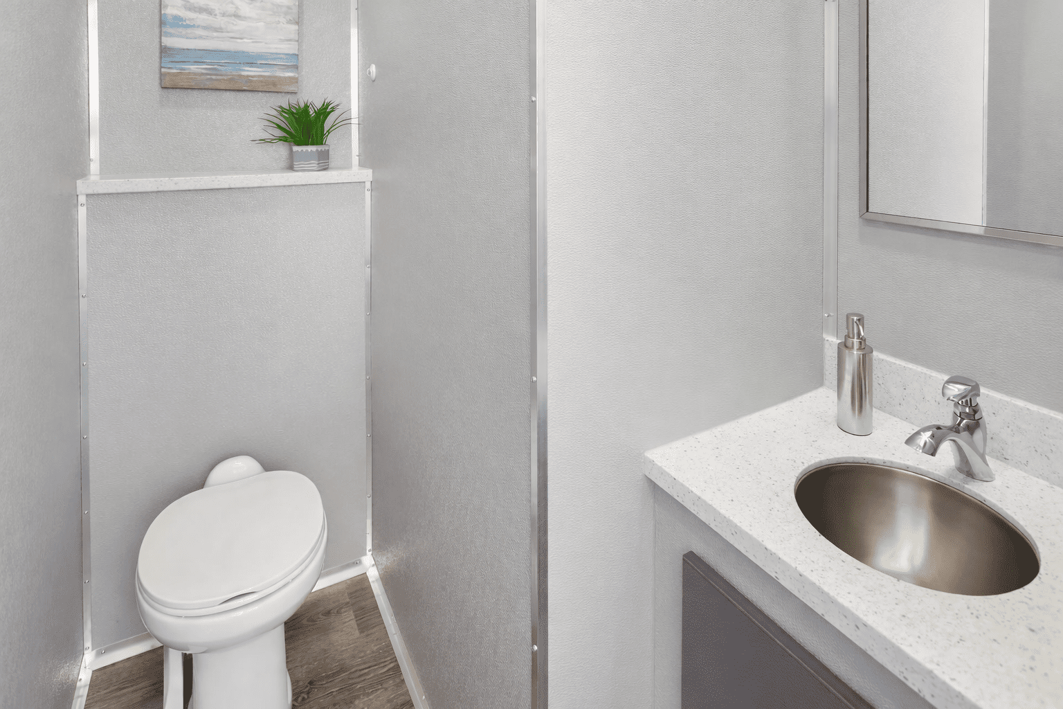 Sink and Toilet inside womens restroom trailer rental